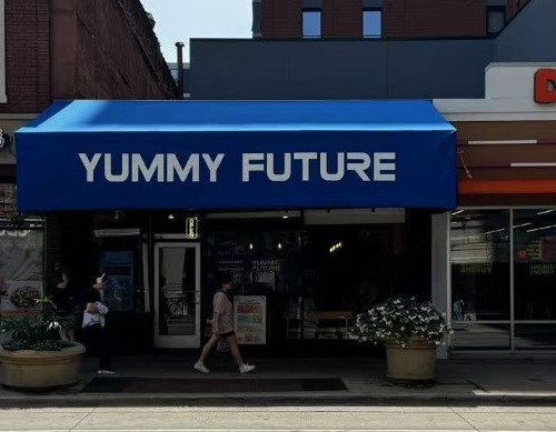 Yummy Future blue awning storefront at 609 East Green Street, Champaign