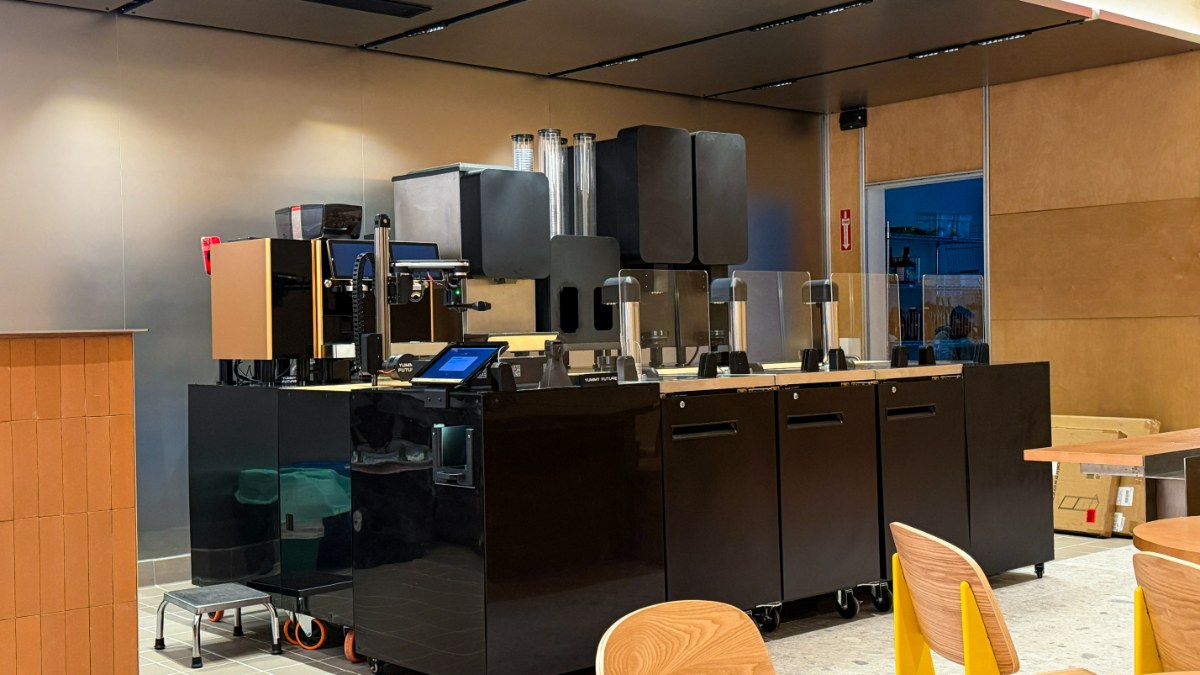 The machine island as one standalone unit on casters, parked in a room